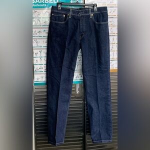 LEVI’S - 514. Men’s jeans. Altered in waist to a 32/32. Blue denim.